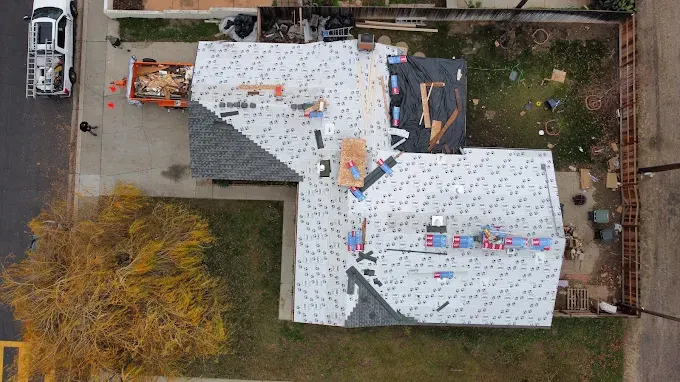 Flawlessly completed high-quality asphalt shingle roof on a suburban home in Modesto California with vibrant color and detailed craftsmanship