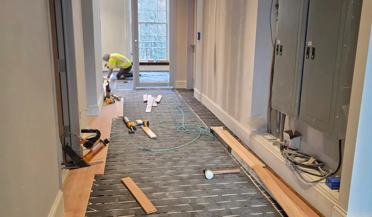 LVP installation over tile in Centreville VA, showcasing seamless transition, rich textures, and inviting ambiance.