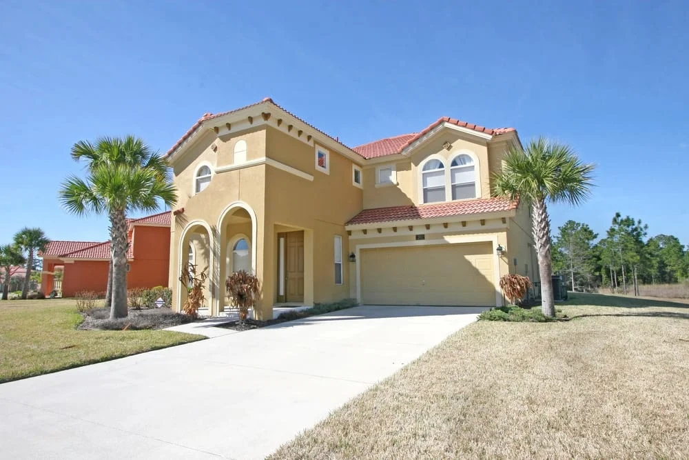 Stucco repair in New Smyrna Beach FL showcasing seamless texture, color match, and fine craftsmanship in a coastal setting.