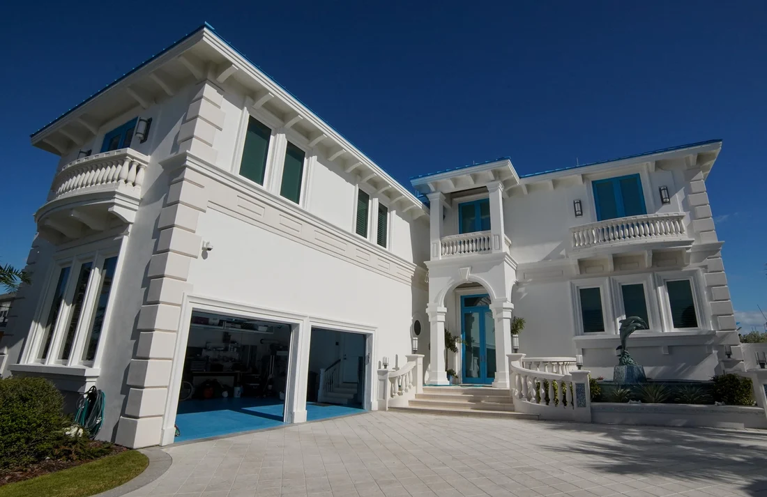 Trim Spraying projects in New Smyrna Beach FL featuring vibrant landscapes and professional equipment