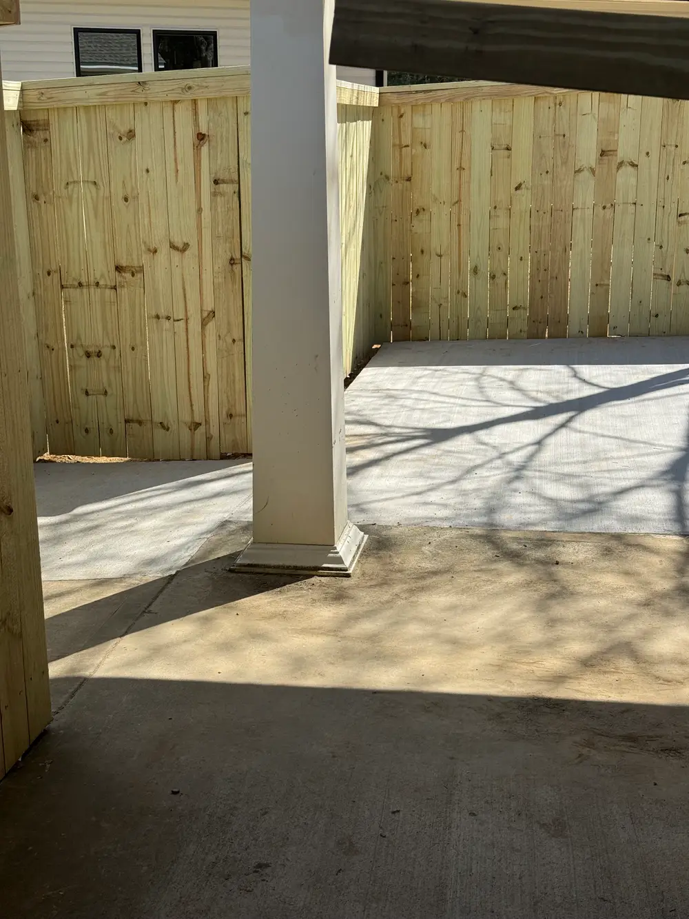 Completed patio in Cohutta GA with stone pavers, outdoor furniture, greenery, and ambient lighting for a serene retreat.
