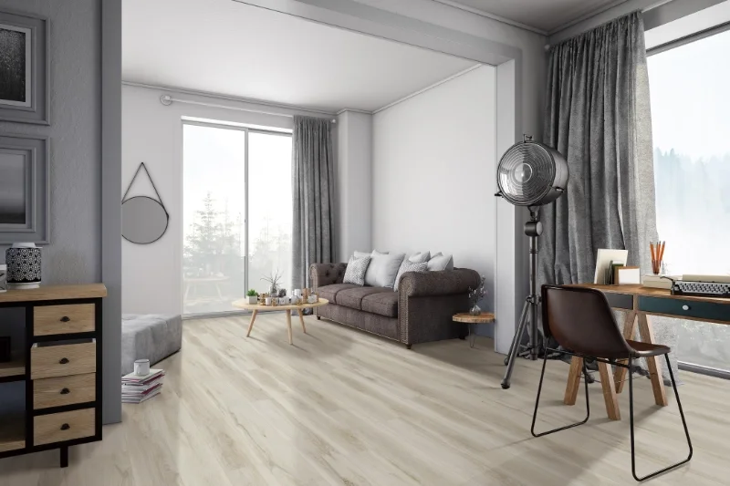 Carpet installation in a modern Round Rock living room with elegant decor and natural light highlighting its texture.
