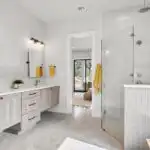 Modern kitchen remodel in Bouldin Creek, TX with sleek appliances, marble countertops, and serene lighting atmosphere.