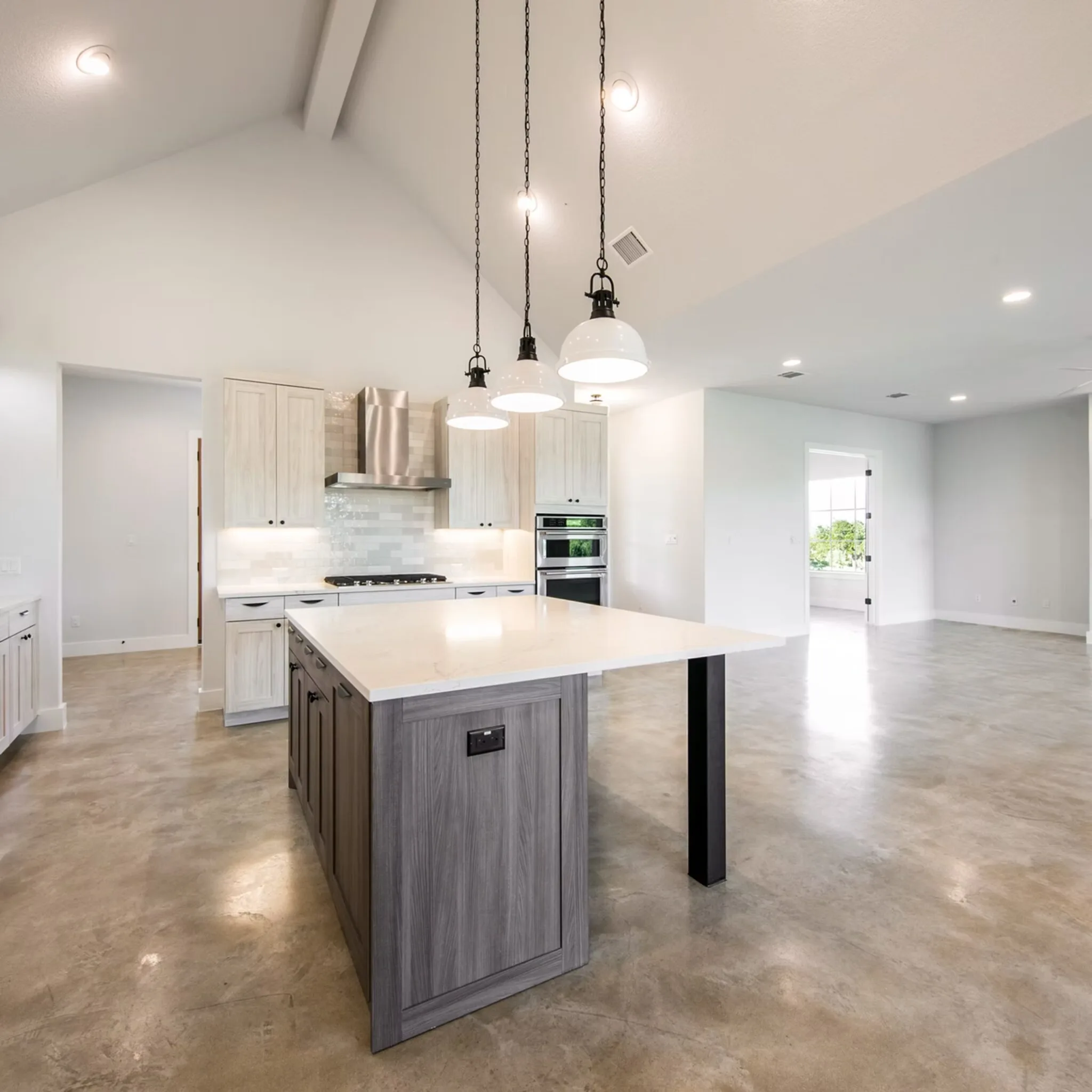Beautifully remodeled kitchen and living space in East Cesar Chavez TX features granite countertops and open floor plan