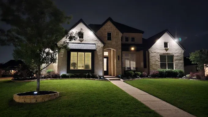 Modern commercial lighting system enhances storefront in Fort Worth, showcasing local architecture and inviting ambiance.