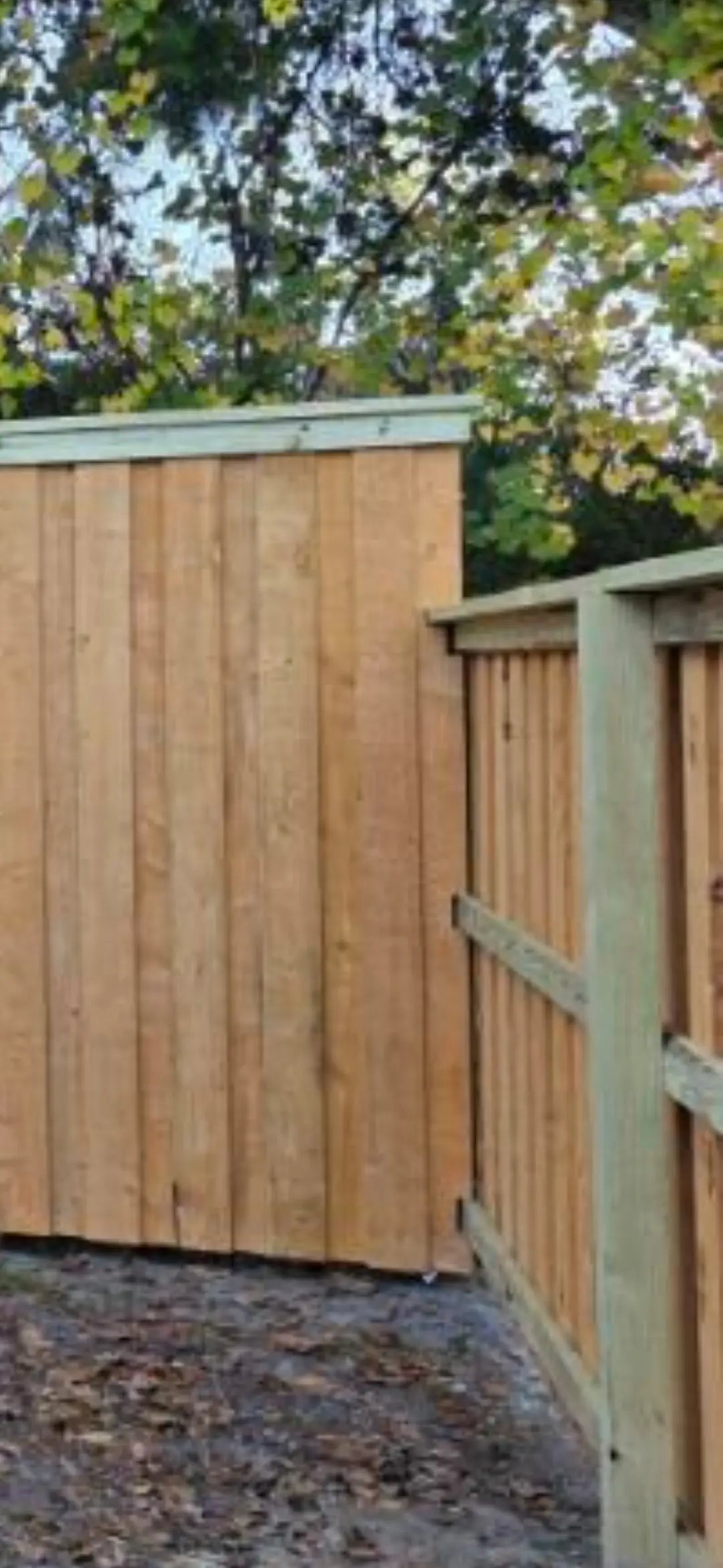 Modern automatic gate installation in St. Augustine FL surrounded by landscaped property and historic architecture.