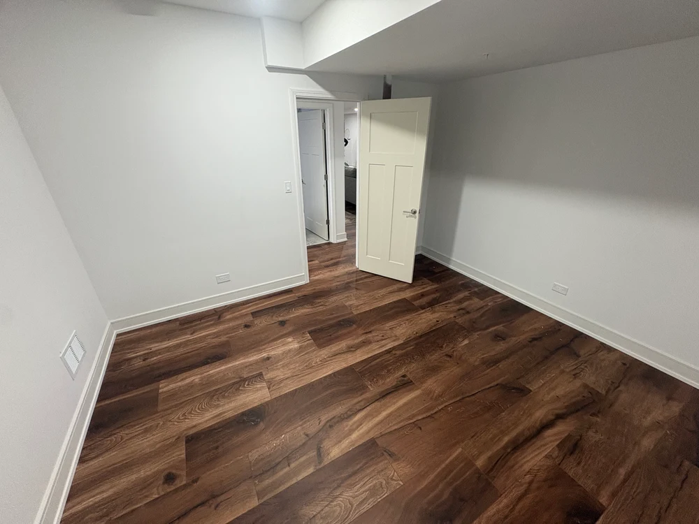 Completed subfloor repair in Darien IL, showcasing smooth textures, natural wood tones, and professional craftsmanship.