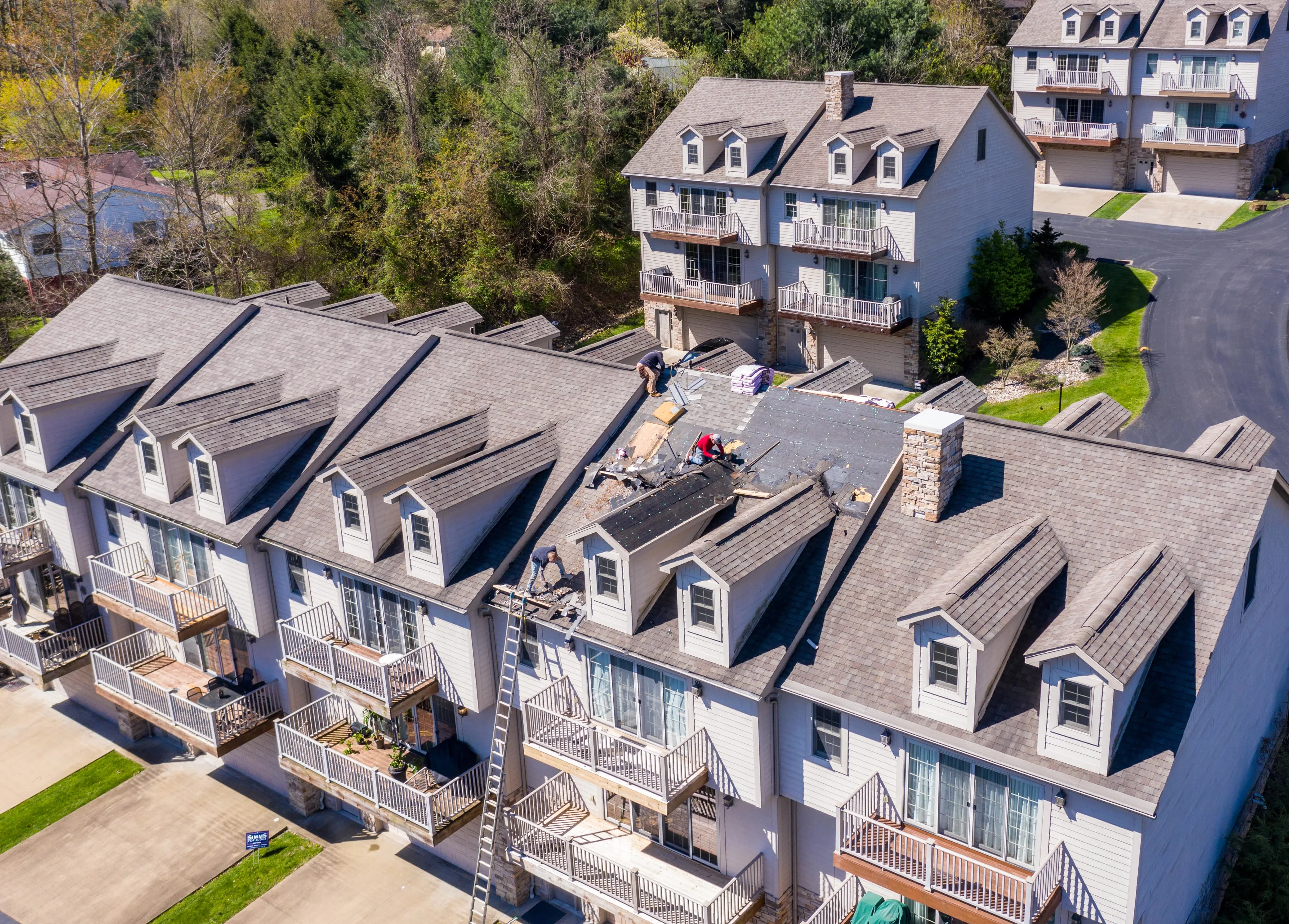 Recently upgraded attic ventilation system with ridge vents, intake and soffit vents, textured shingles, and detailed roofing in a modern home in Modesto California