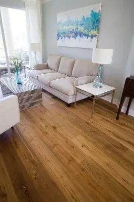 Luxurious carpet flooring installation in a modern Naples living space, featuring soft textures and coastal decor.