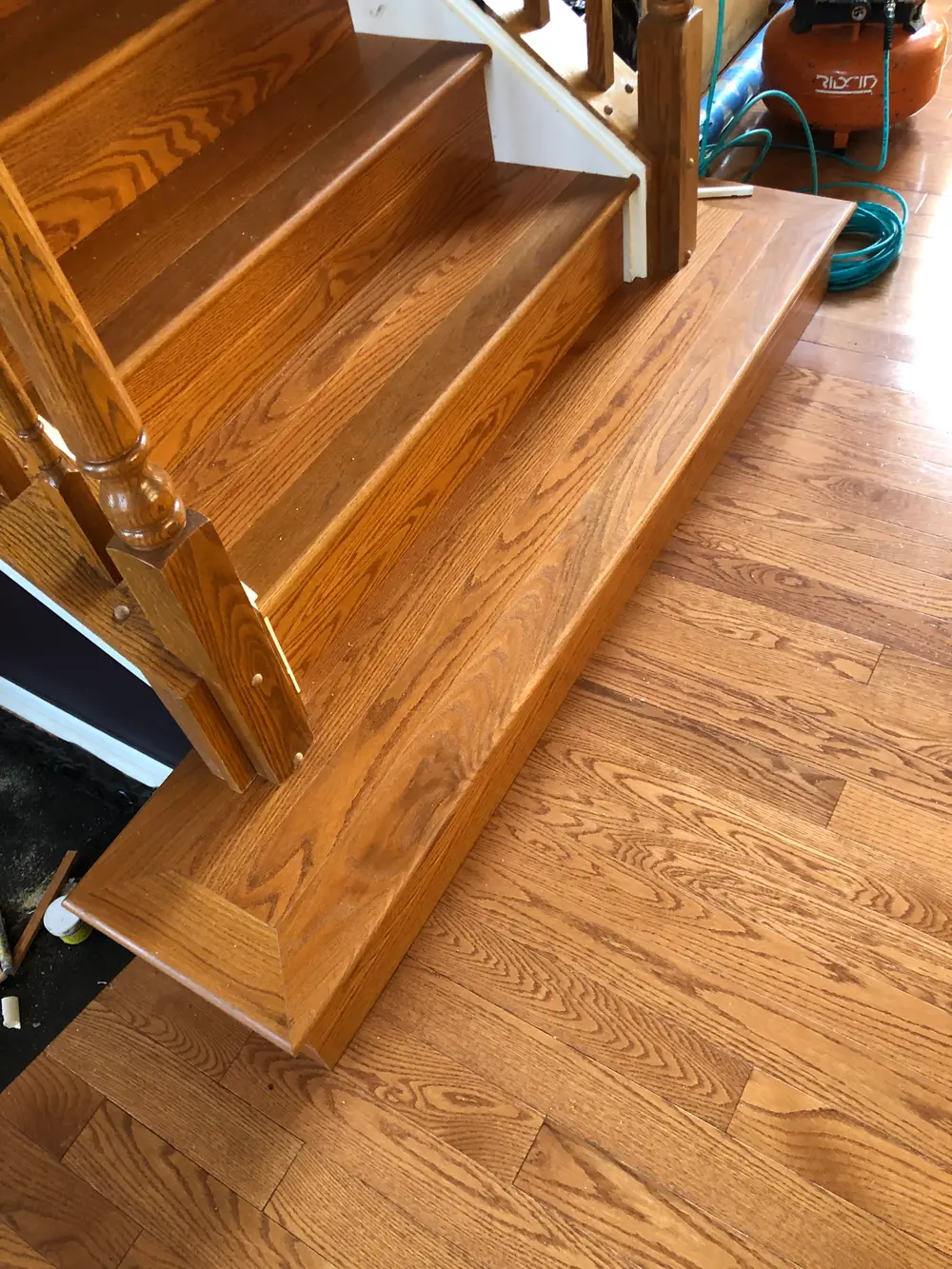 Flooring in Bolingbrook, IL showcasing a modern design with wooden planks and a cozy atmosphere.
