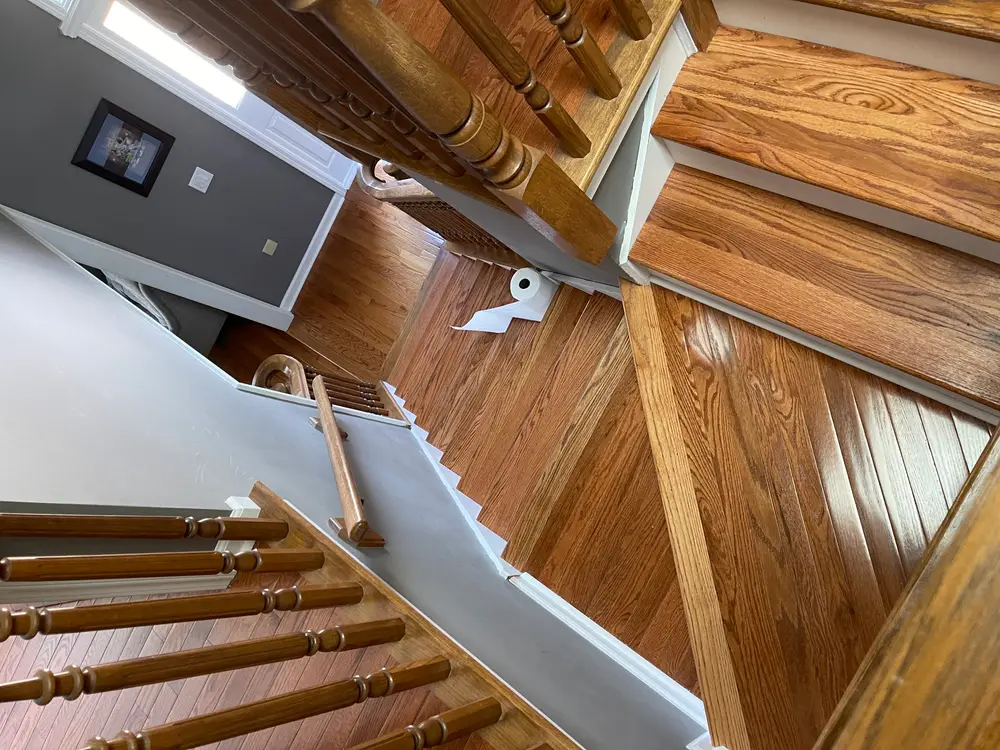 Self-leveling underlayment installation in Darien IL showcasing a smooth light gray surface in a professional workspace.