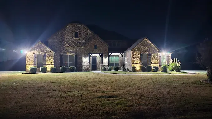 Completed lighting installation in Fort Worth TX showcasing modern building exterior with energy-efficient LED lighting.