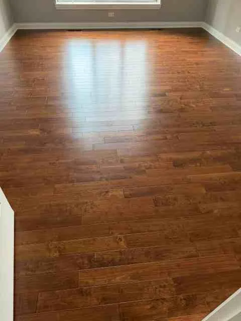 Flooring installation in Woodridge, IL with various samples and styles displayed on the showroom floor.
