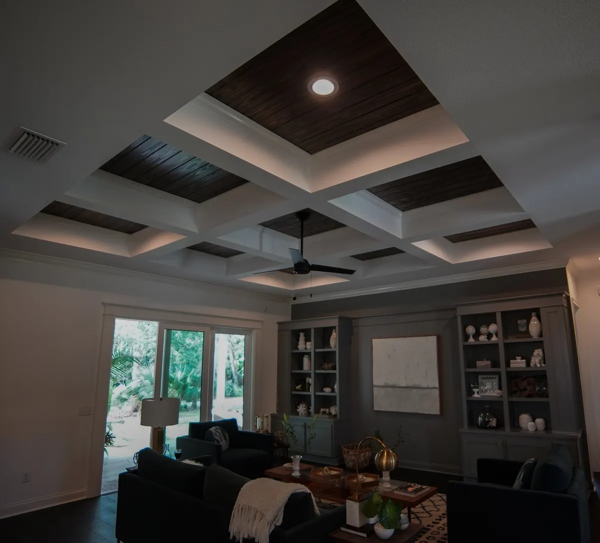 Custom woodwork painting in New Smyrna Beach, showcasing intricate details, vibrant colors, and professional tools.