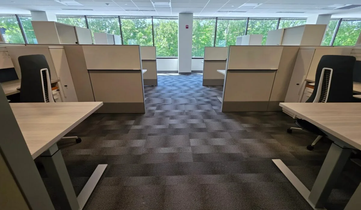 Flooring installation in Bristow VA showcasing hardwood and carpet options in a modern home setting.