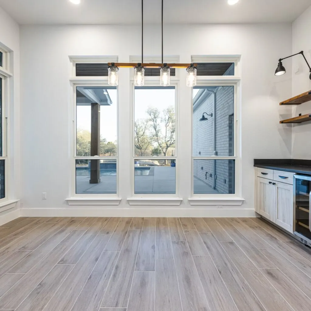 Modern home remodel in Spicewood TX featuring open layout, natural light, refined design, and cozy decor.