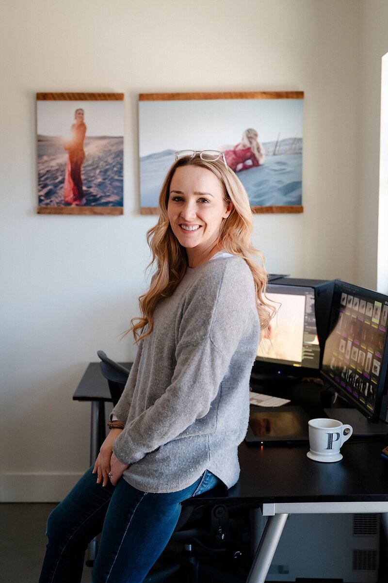 Paige McLeod editing newborn photography
