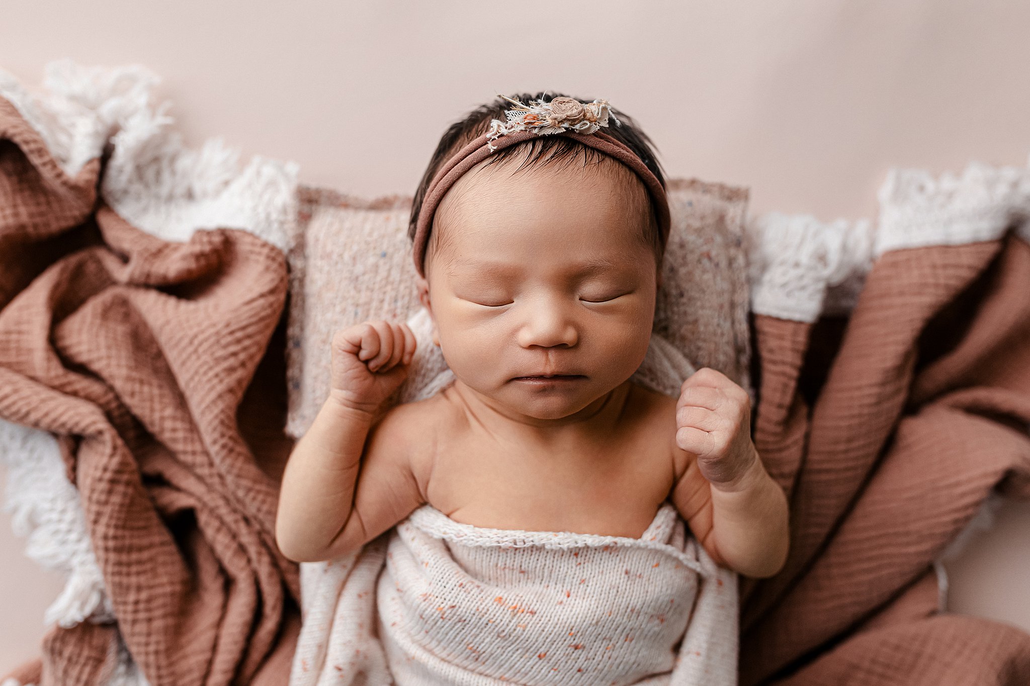Newborn photo after jaundice color correction with natural skin tones
