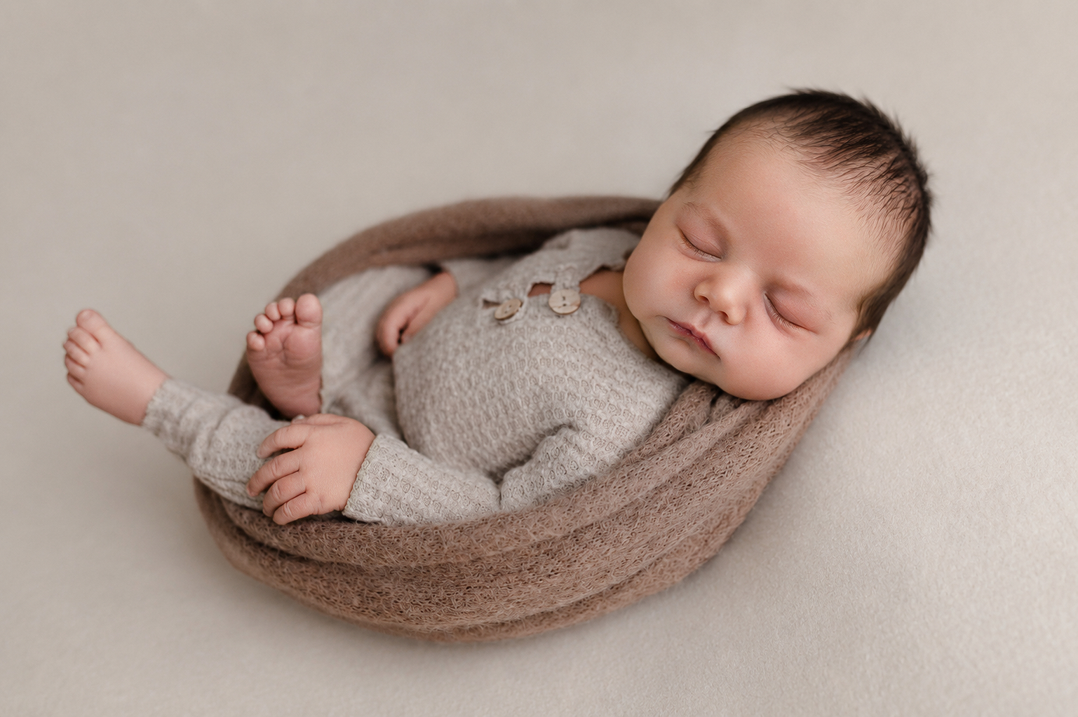 Edited newborn photo after professional newborn retouching and color correction