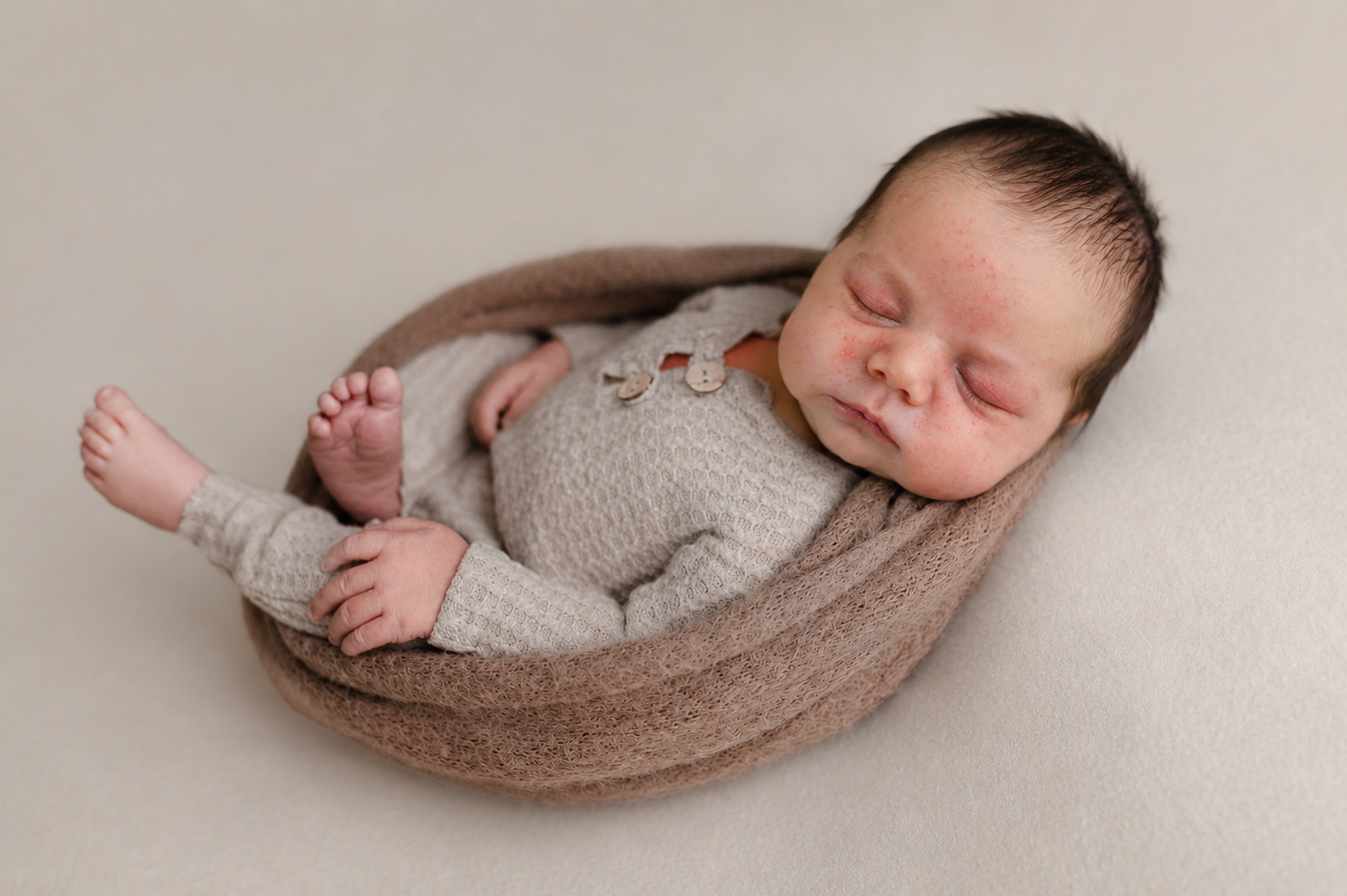 Straight out of camera newborn photo before professional editing and retouching