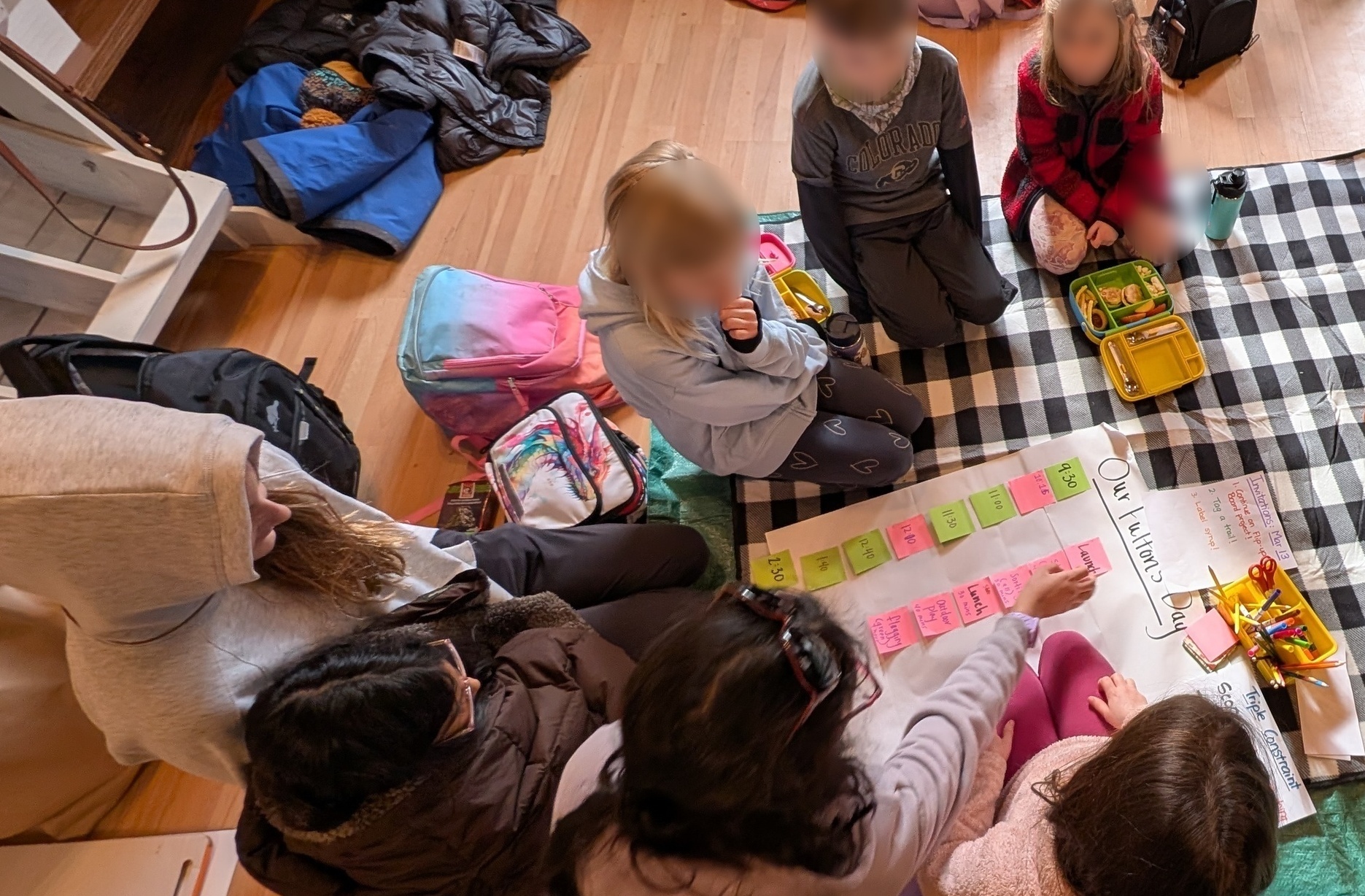 Children collaborating on planning their day