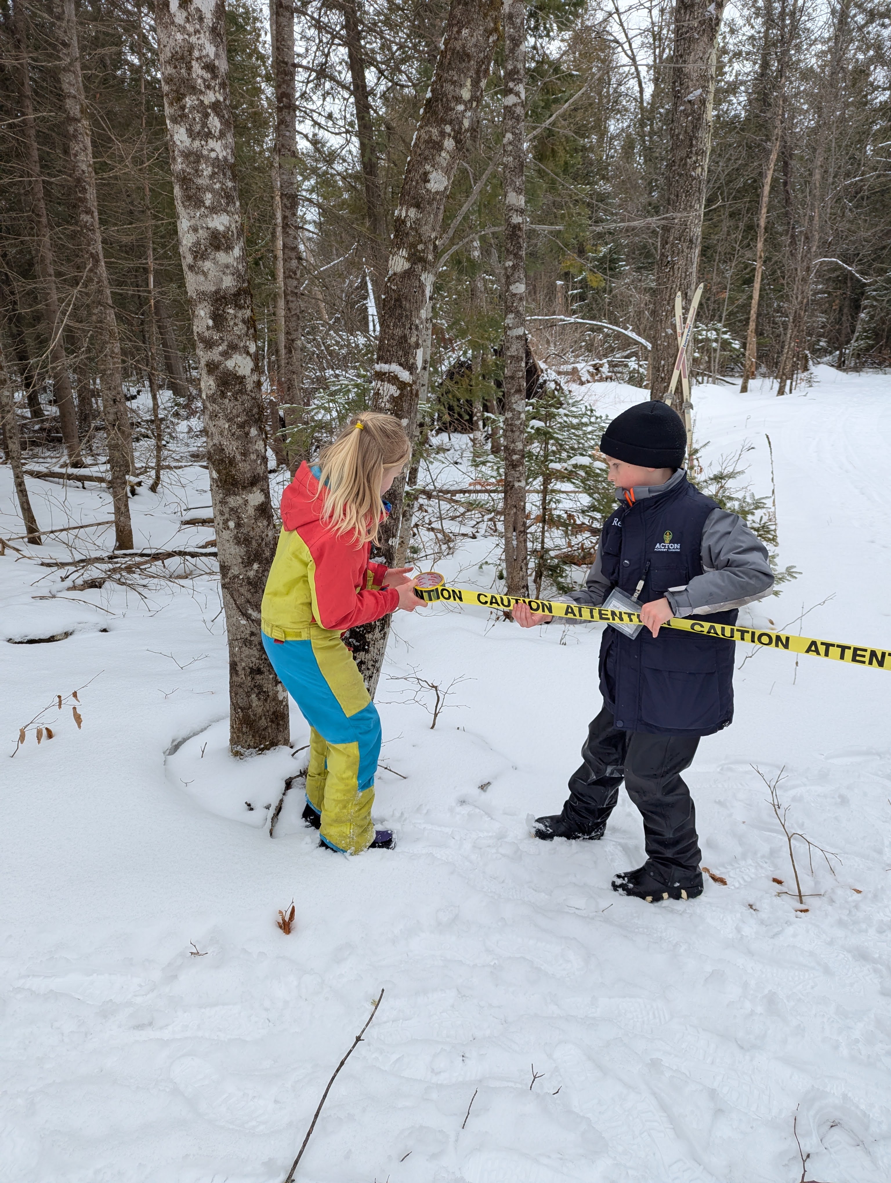 Blocking off a trail with caution tape to ensure visitor safety