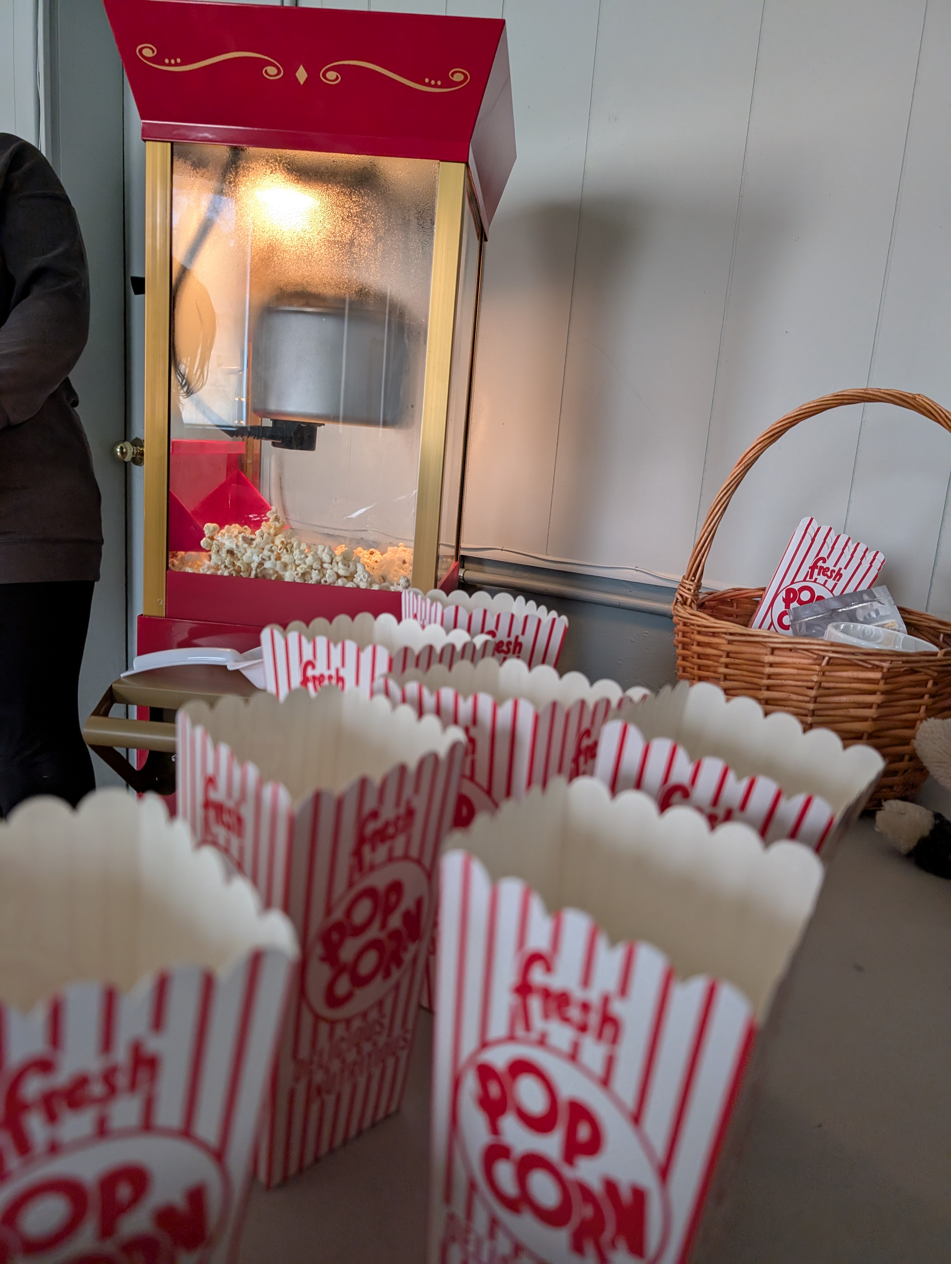 Learners enjoying the popcorn machine they earned for their end of session party