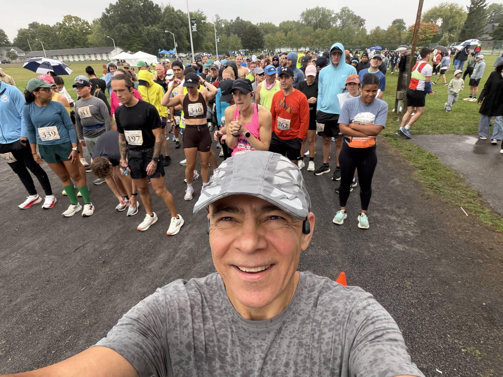Igor at the start line in the rain at Rhinebeck Half Marathon 2026.