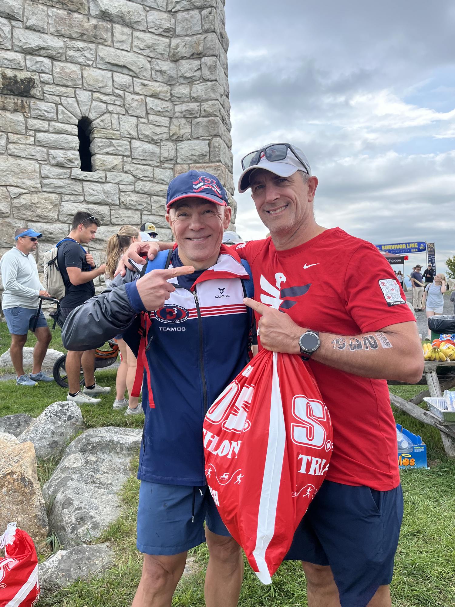 Igor and coach Mike Ricci after finishing S.O.S. Triathlon 2026. Igor and coach Mike Ricci after finishing S.O.S. Triathlon 2026.