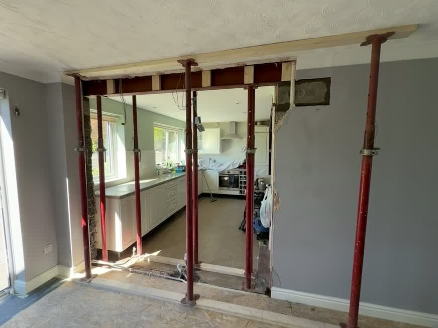 Structural steel RSJ installation forming an open-plan kitchen opening in Halesowen