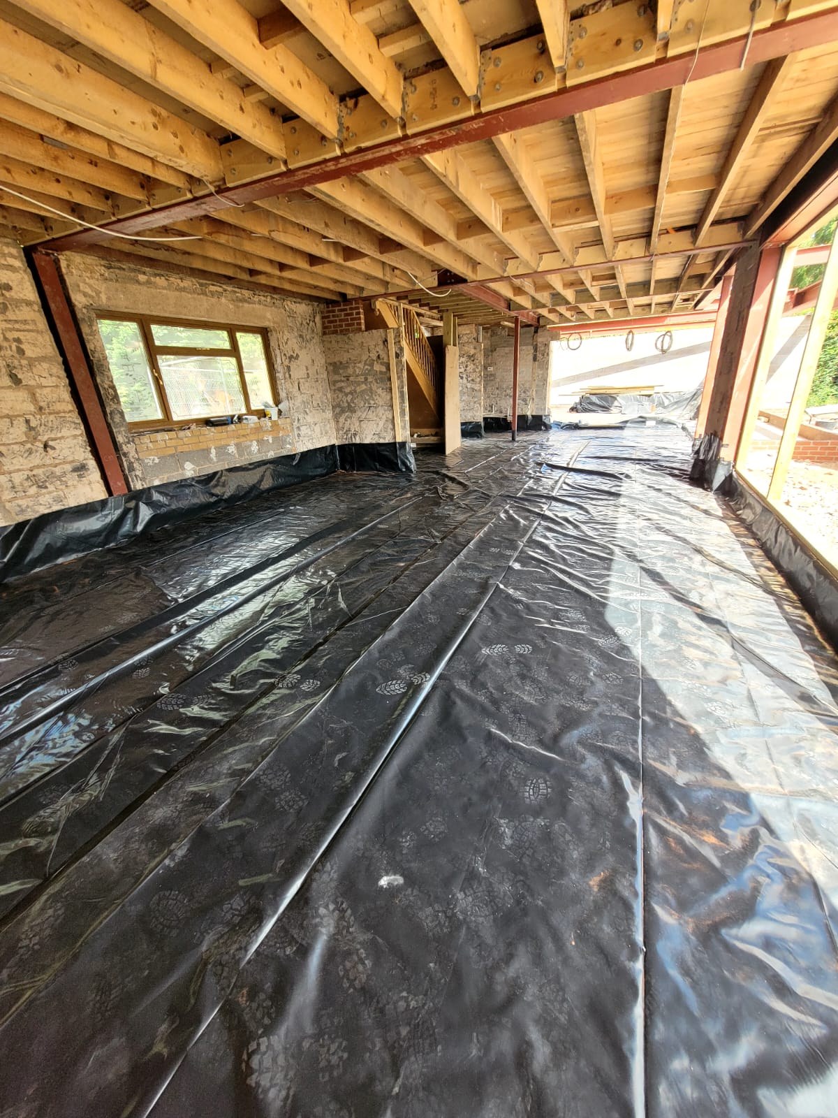 Damp-proof membrane installed across the ground floor at the Solihull Road renovation
