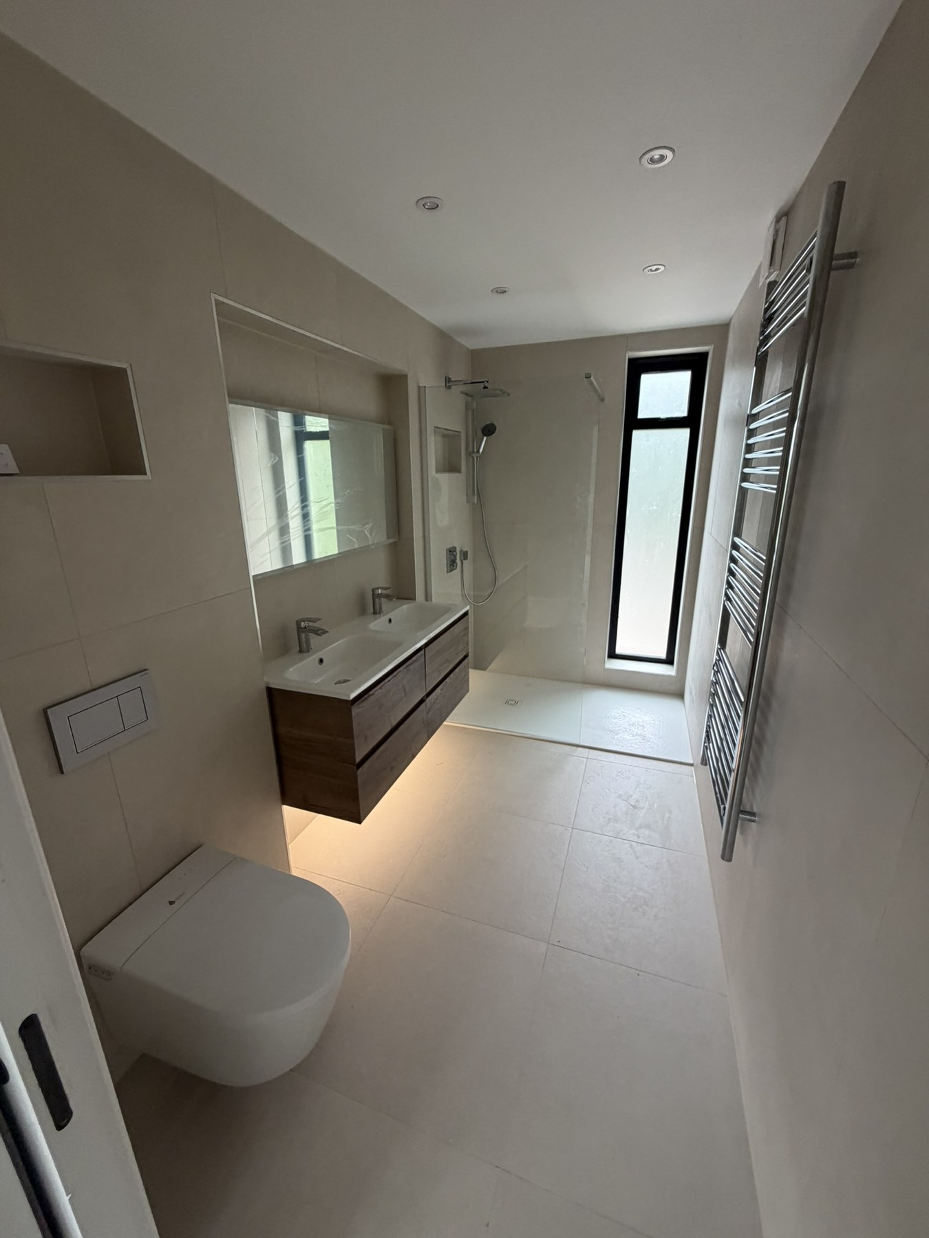 Completed master ensuite with floating vanity and walk-in shower at Solihull Road