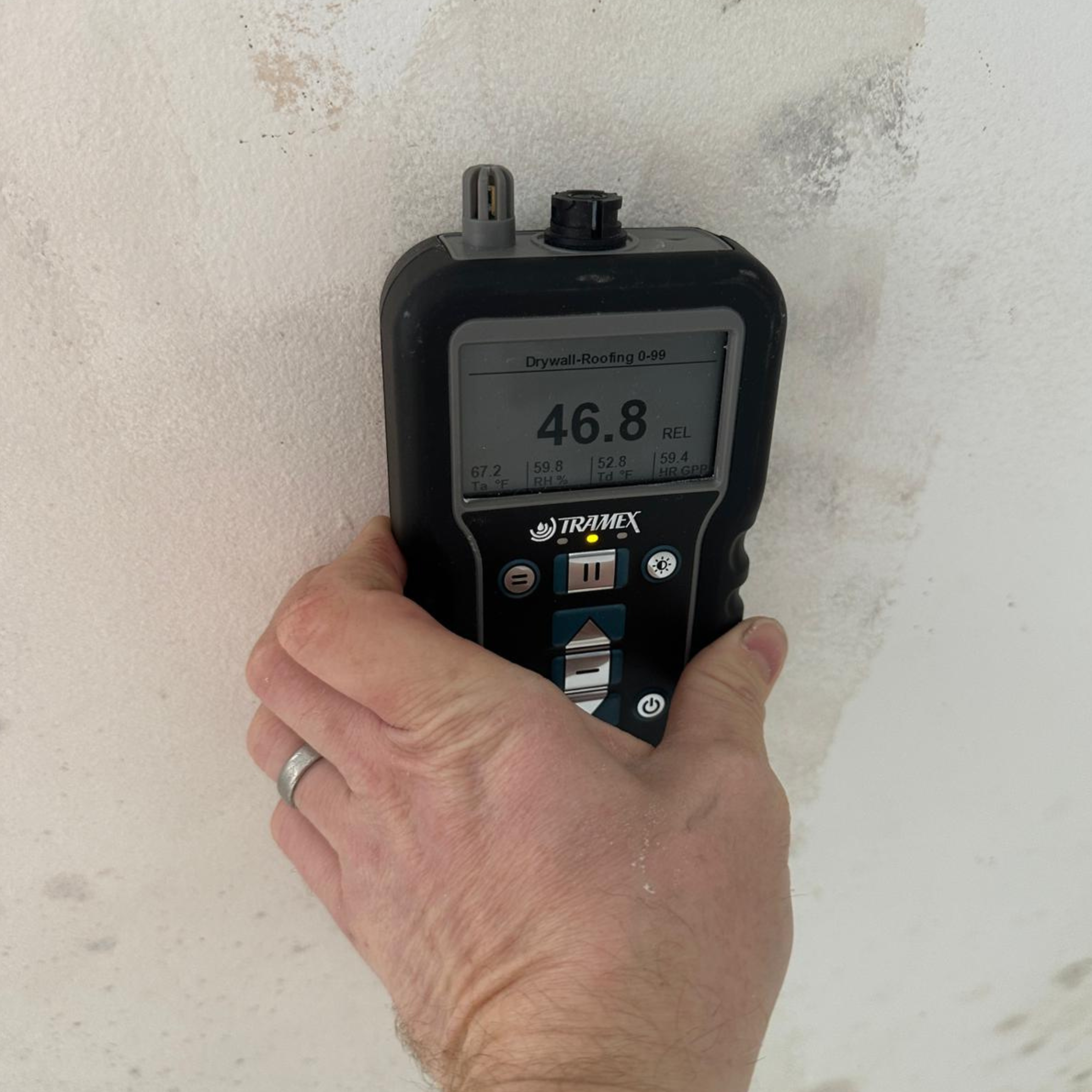 Moisture meter reading on a water-damaged laundry ceiling in South Penrith, NSW