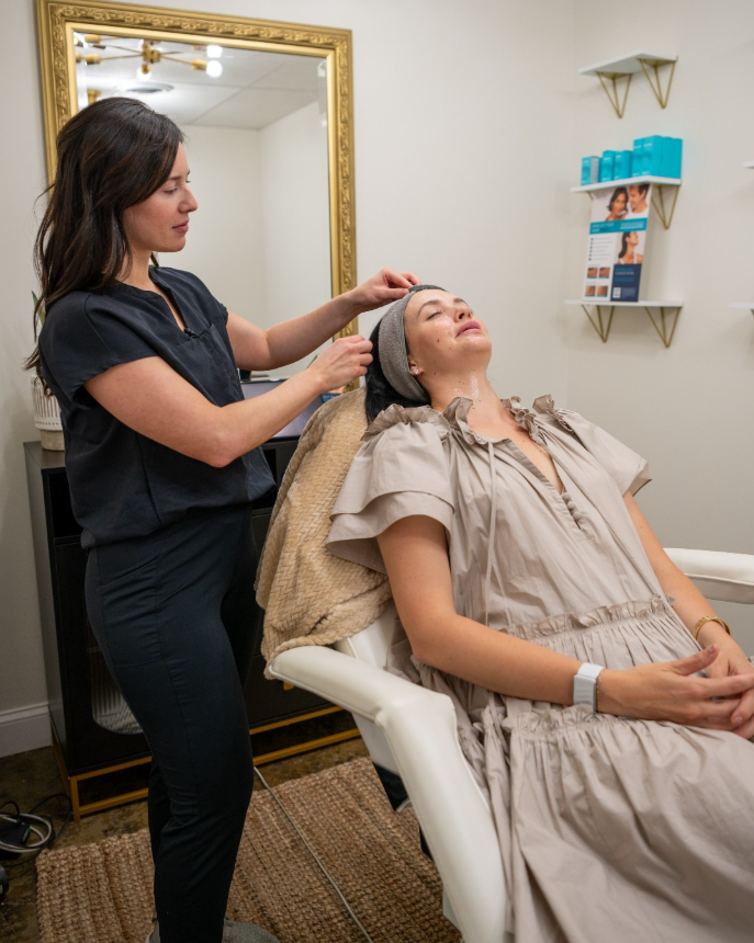 Whitney Buckland, PA-C, with a patient at Shoreline Aesthetics