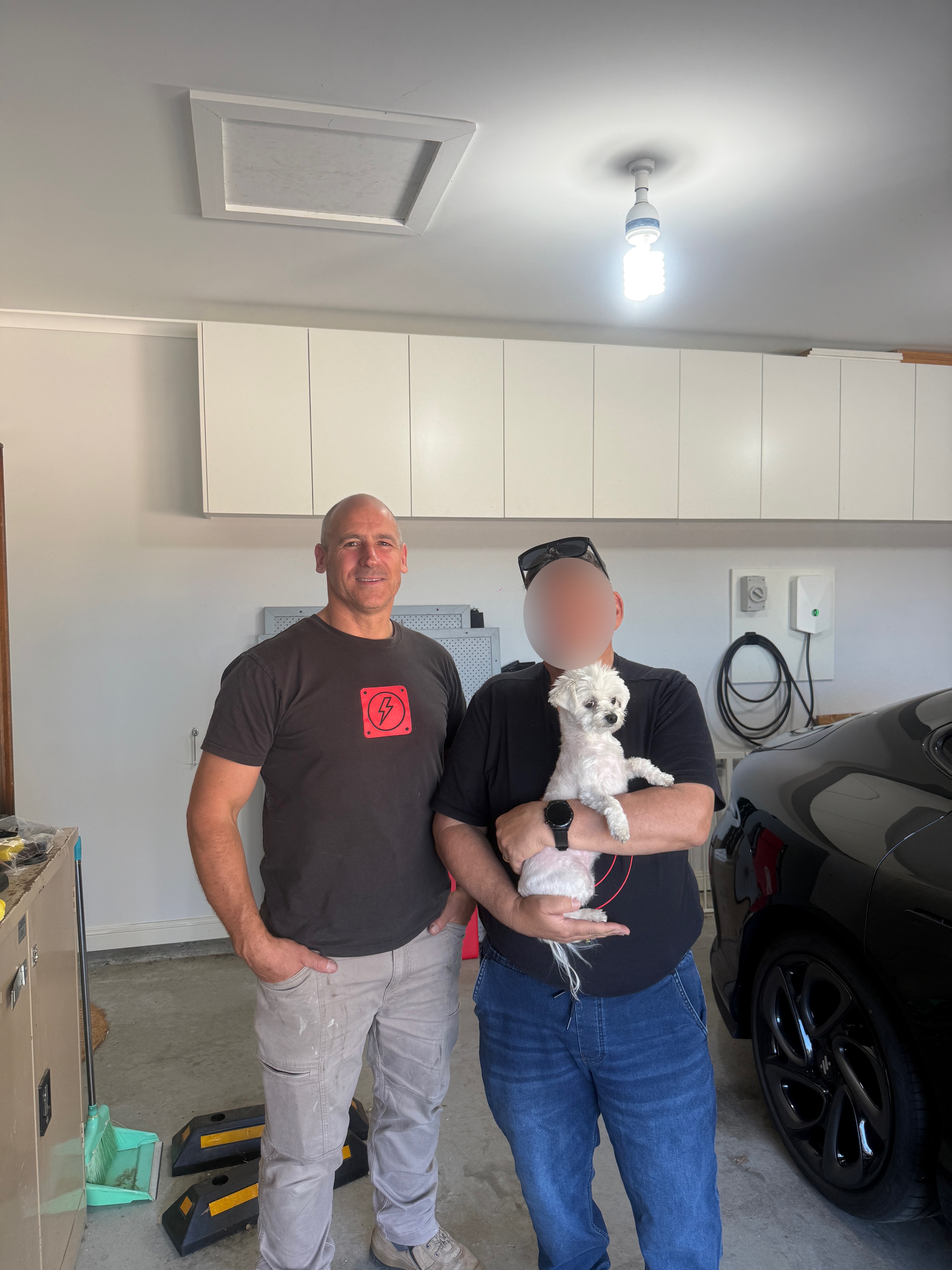 Chris with his customer at an EV charger install