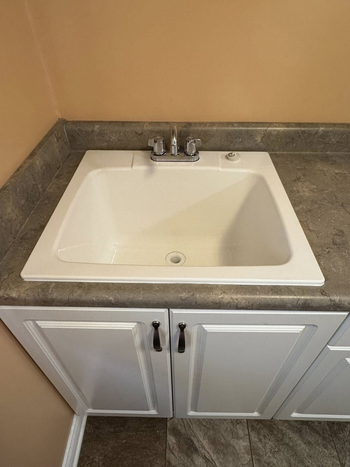 Utility sink replacement before and after, by Salty Dog Plumbing