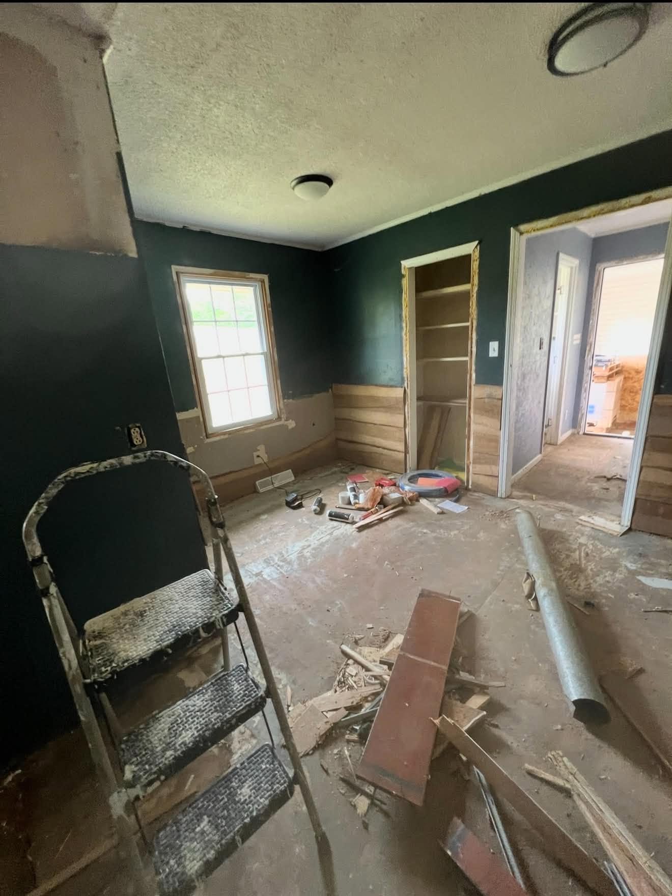 Adding Tongue and Groove, updating trim, and flooring — after