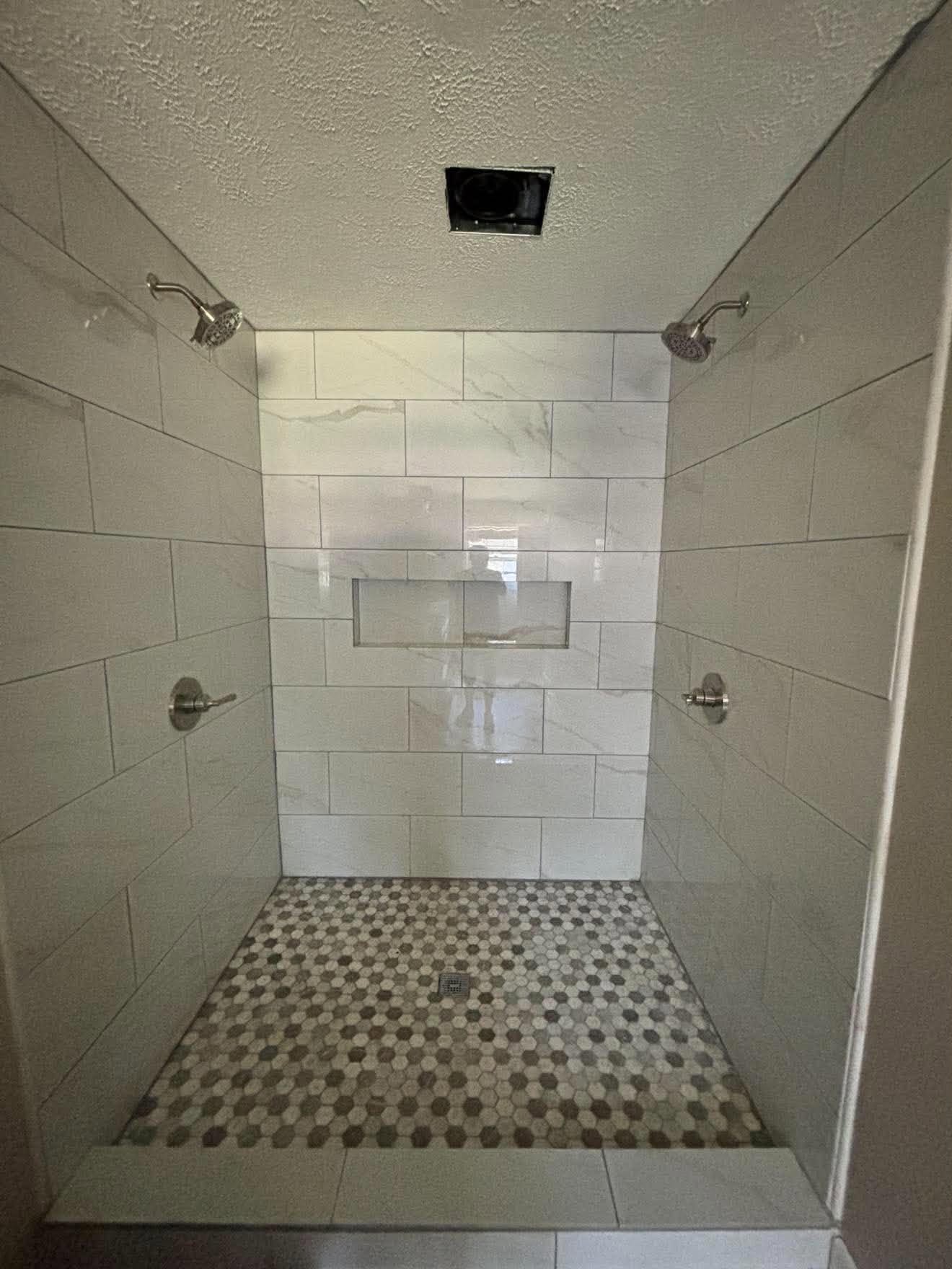 Finished shower with a tiled surround