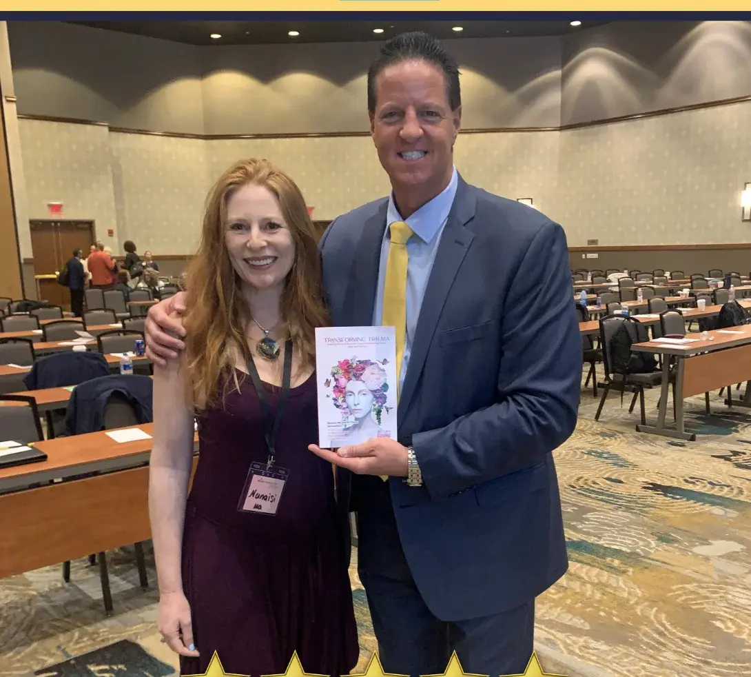 James Melinchak holding Nunaisi Ma's book