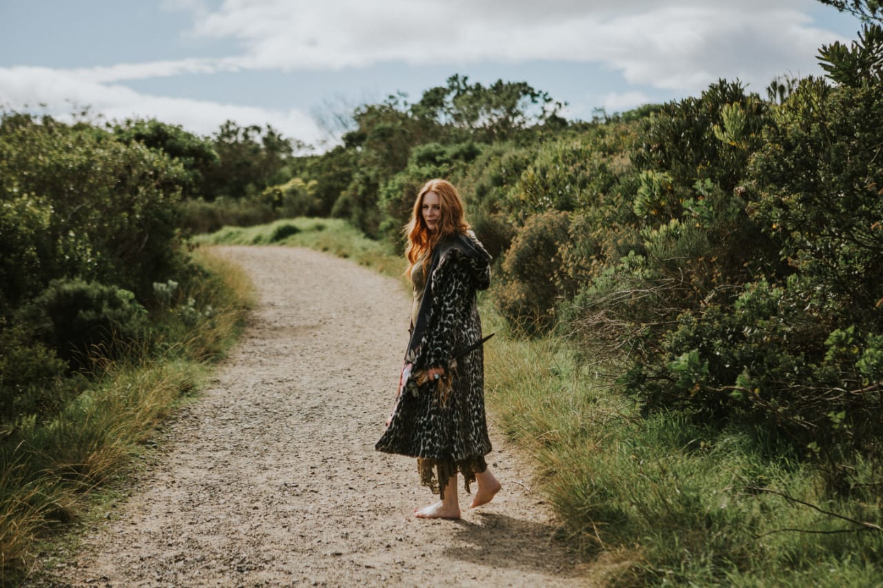 Nunaisi Ma walking on a path