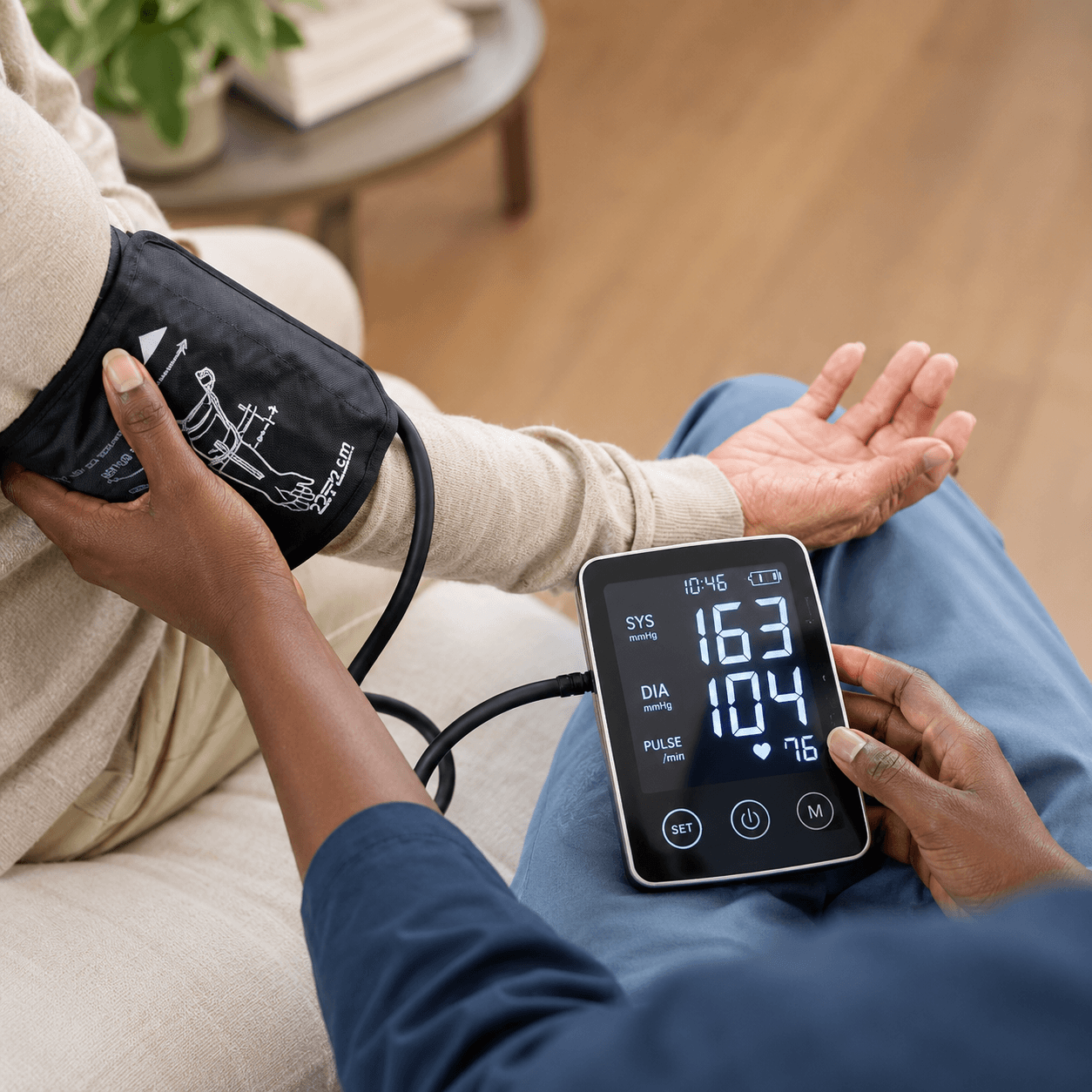 Healthcare provider measuring a patient’s blood pressure during a preventive wellness evaluation.