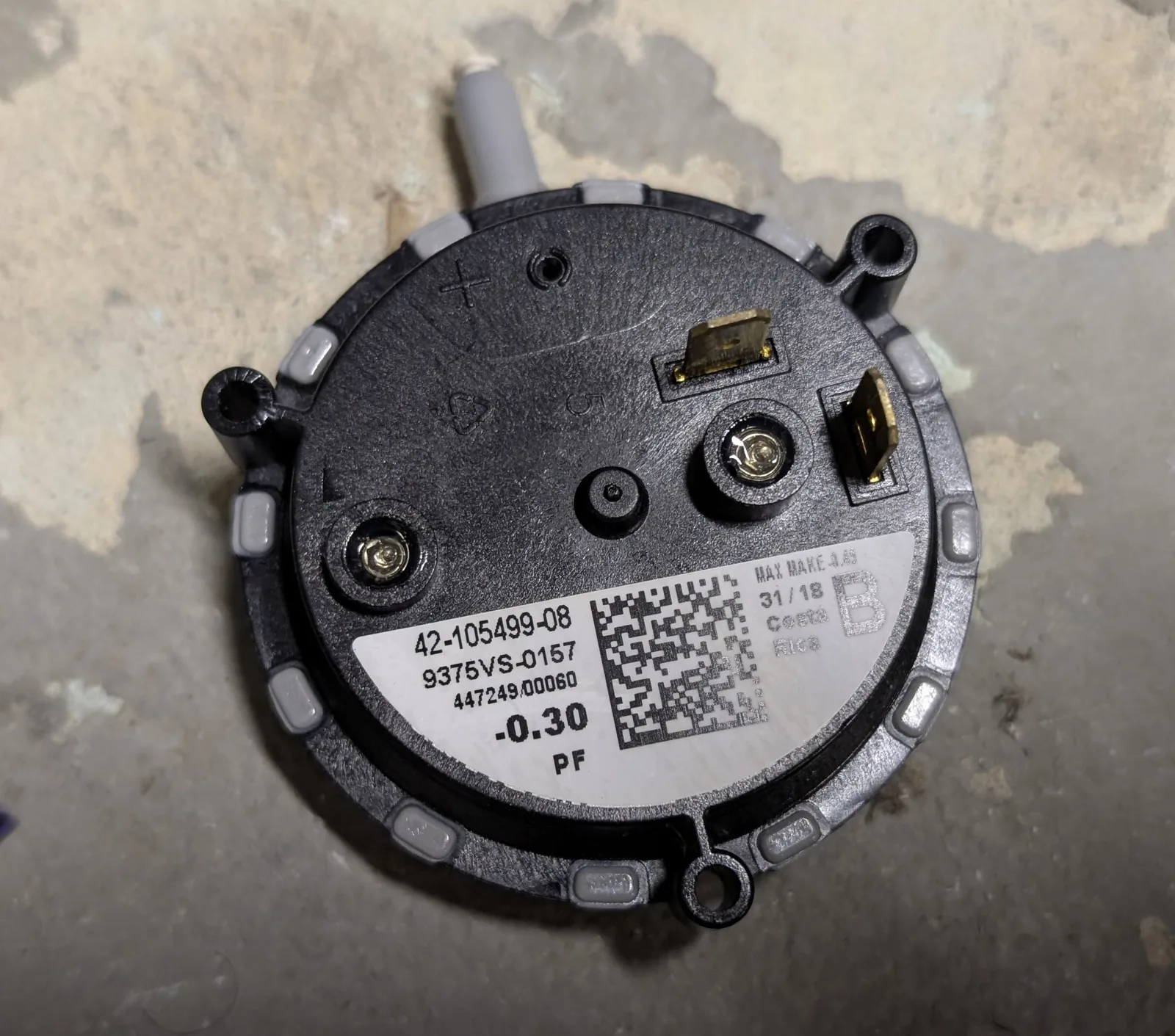 Furnace pressure switch removed during a gas furnace ignition repair in Monmouth County, NJ