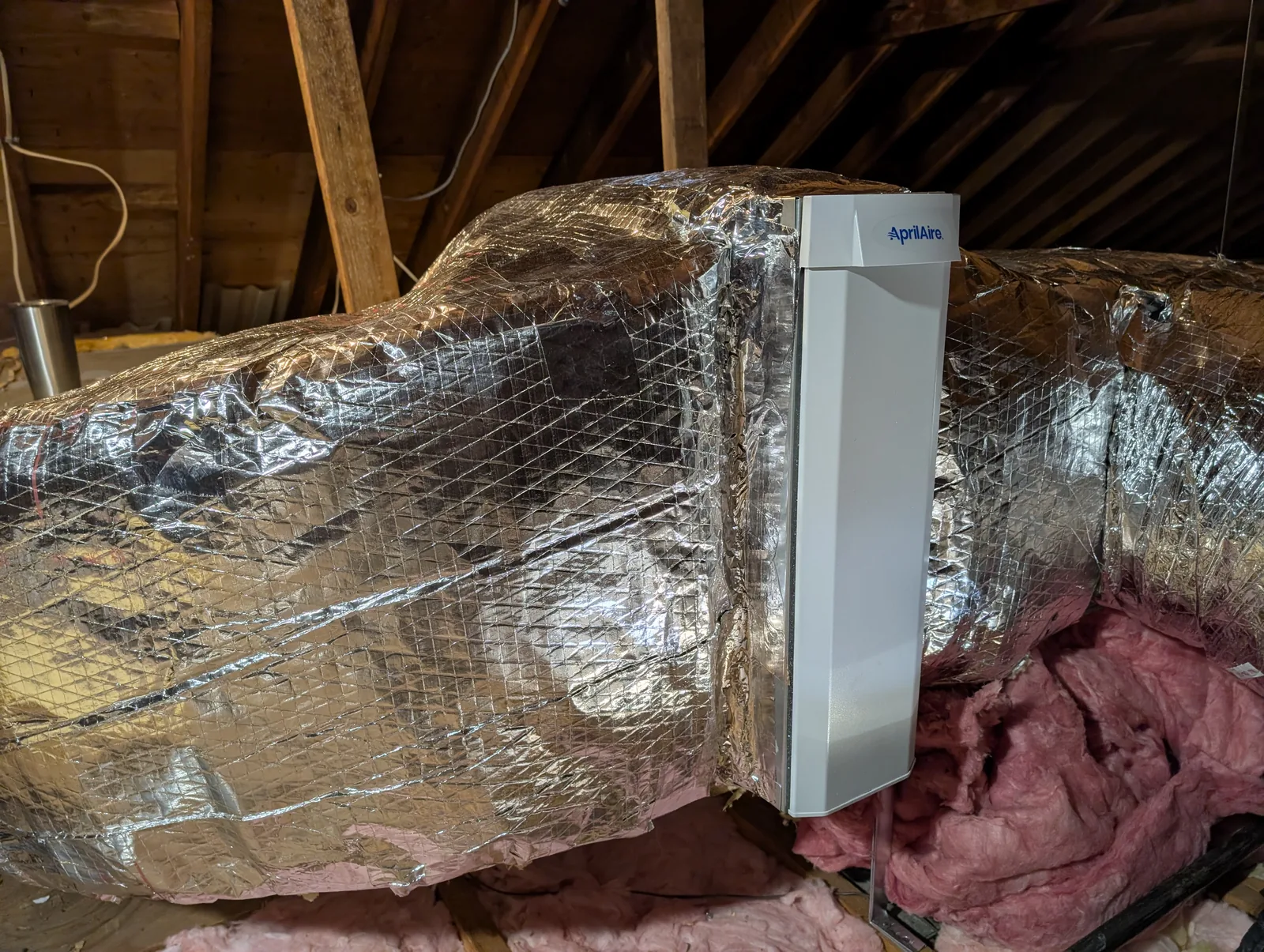 Air cleaner mounted on attic ductwork in a Monmouth County, NJ home