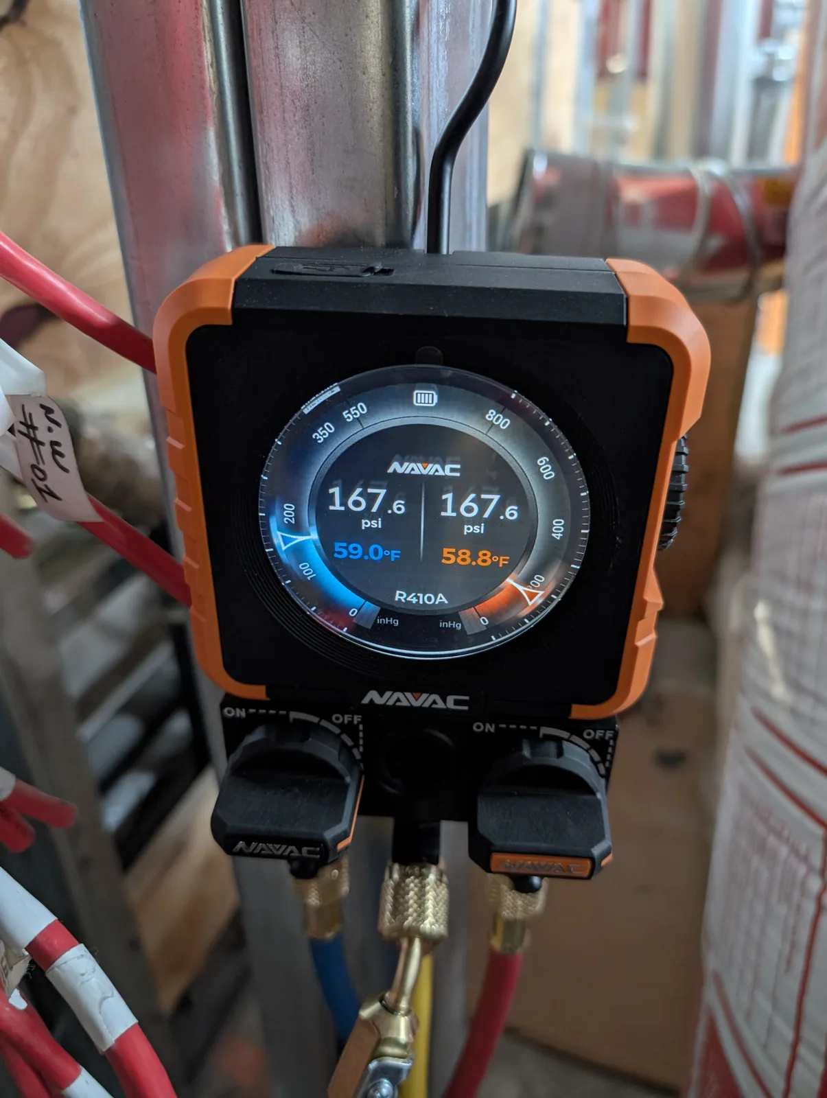 Digital R410A refrigerant gauges on an HVAC job in Monmouth County, NJ