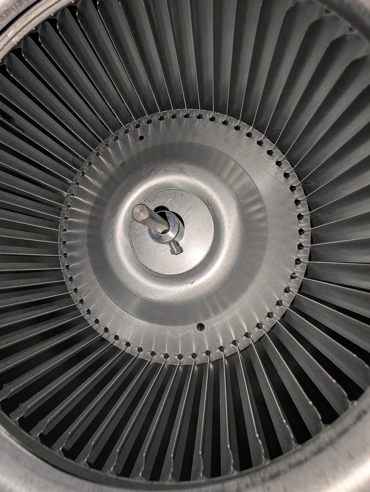 Clean blower wheel inside an air handler in Monmouth County, NJ