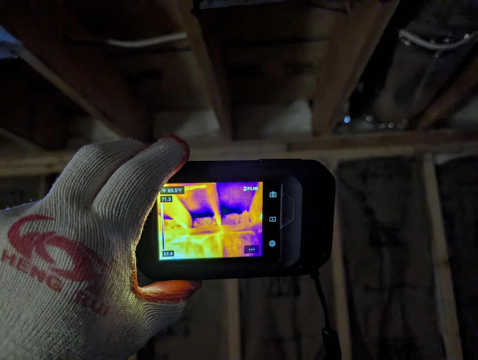 Thermal imaging camera inspecting a home for heat loss in Freehold, NJ