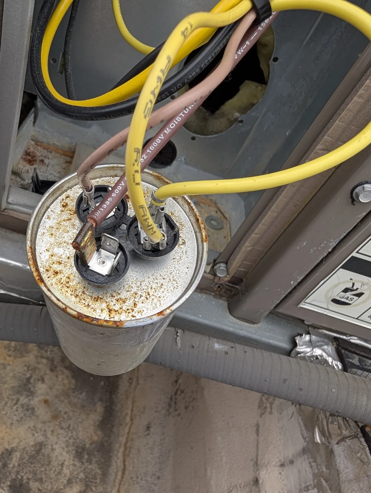 Corroded run capacitor found during an AC repair in Monmouth County, NJ