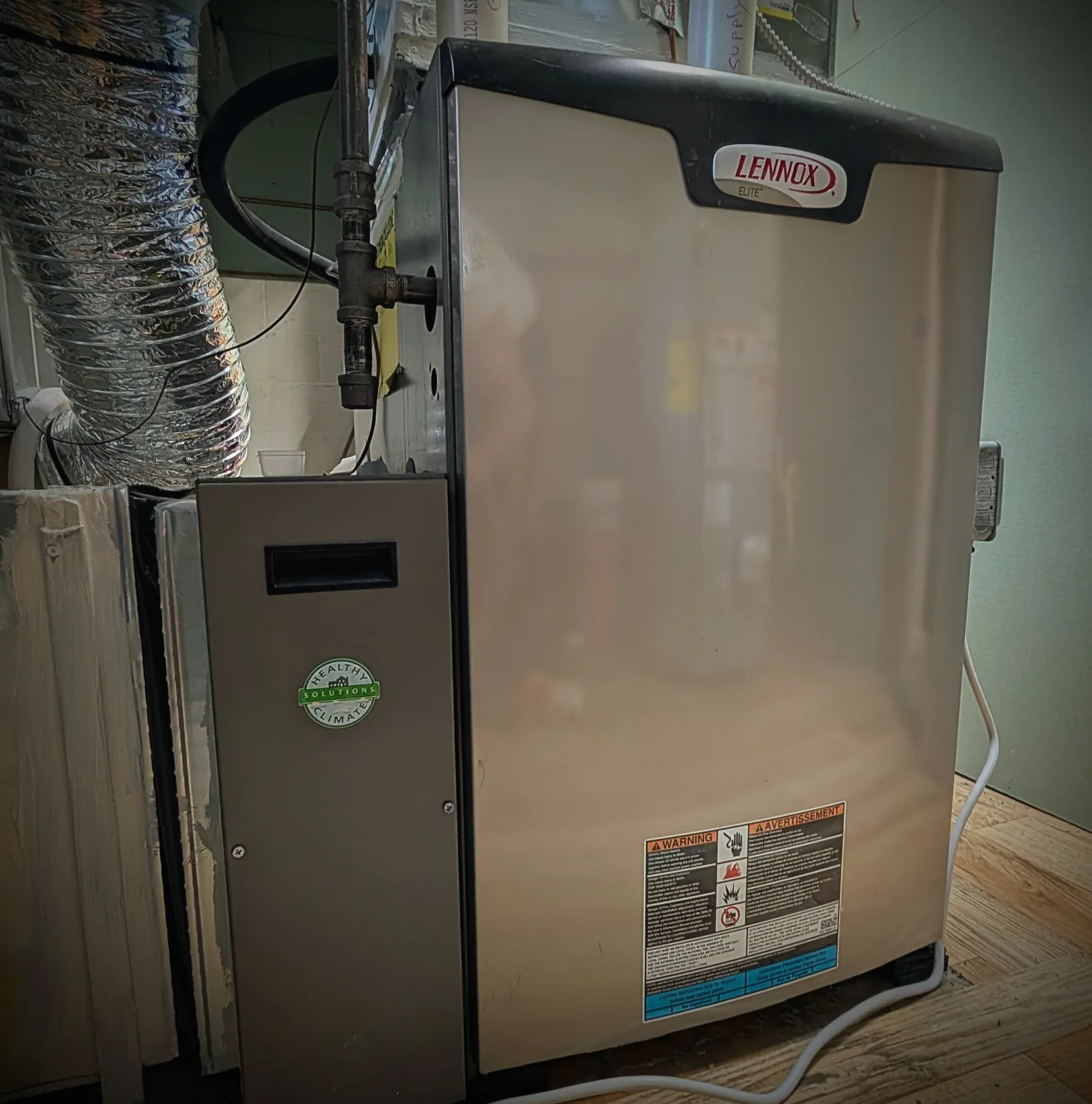 Lennox high-efficiency furnace installed in a Monmouth County, NJ basement