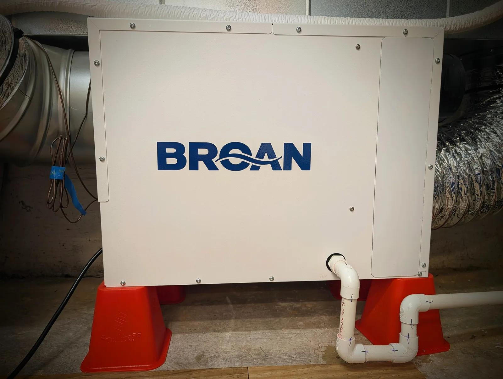 Broan whole-home dehumidifier tied into the ductwork in a Monmouth County, NJ home