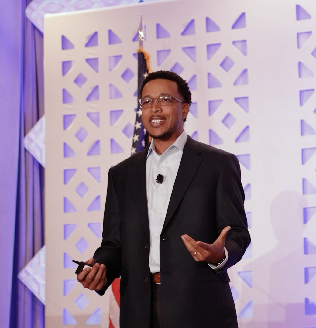 Marcus G. Phillips engaging the audience during a keynote